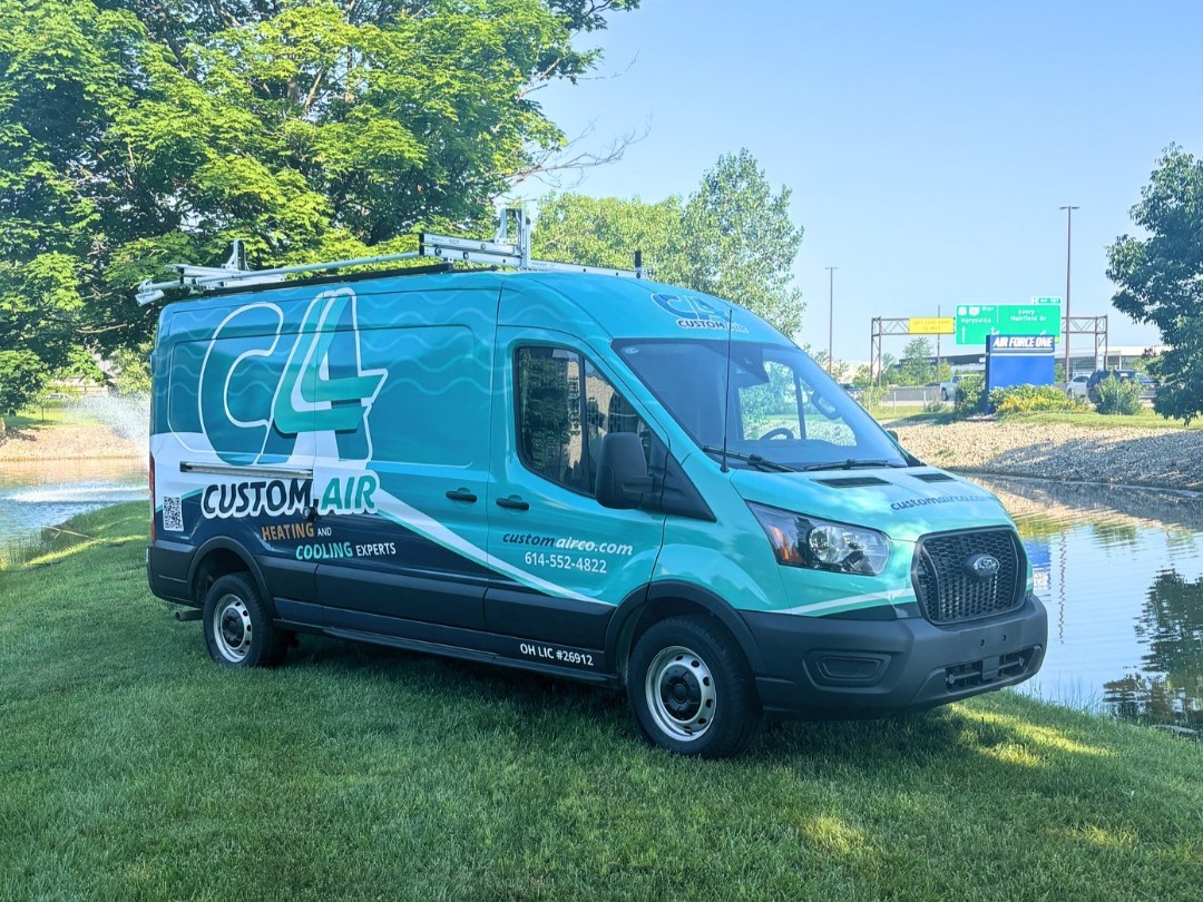 New Wrapped Van In Grass
